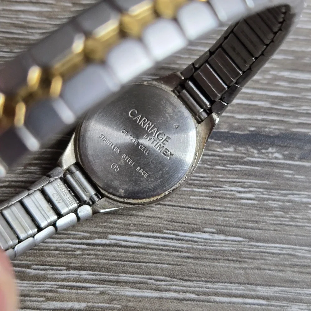 Timex Carriage Women's Quartz Watch Silver Gold Tone Stretch Band Analog Dress